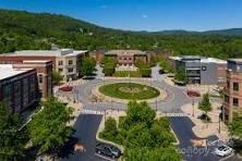 12 South Ridge Place Arden, NC 28704 - Photo 38 of 41 a swimming pool with outdoor seating and yard