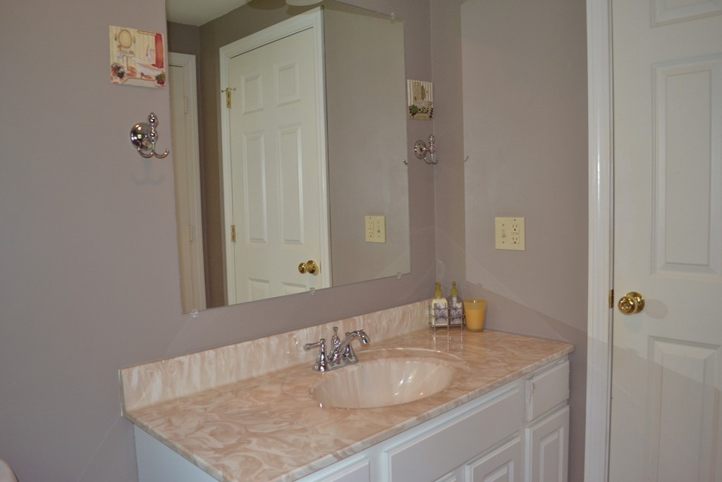 25 Forge Road Freetown, MA 02702 - Photo 13 of 21 a bathroom with a granite countertop sink and a mirror
