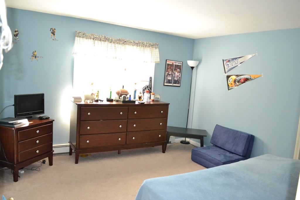 25 Forge Road Freetown, MA 02702 - Photo 14 of 21 a bedroom with a bed and a television