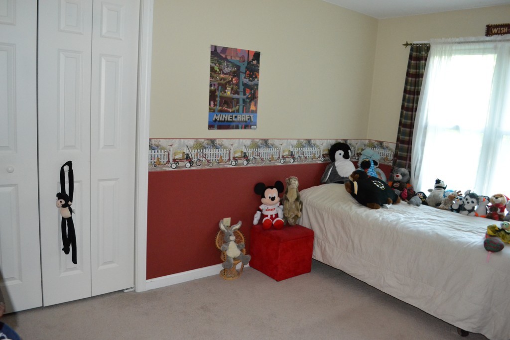 25 Forge Road Freetown, MA 02702 - Photo 15 of 21 a bed room with a bed and a couch