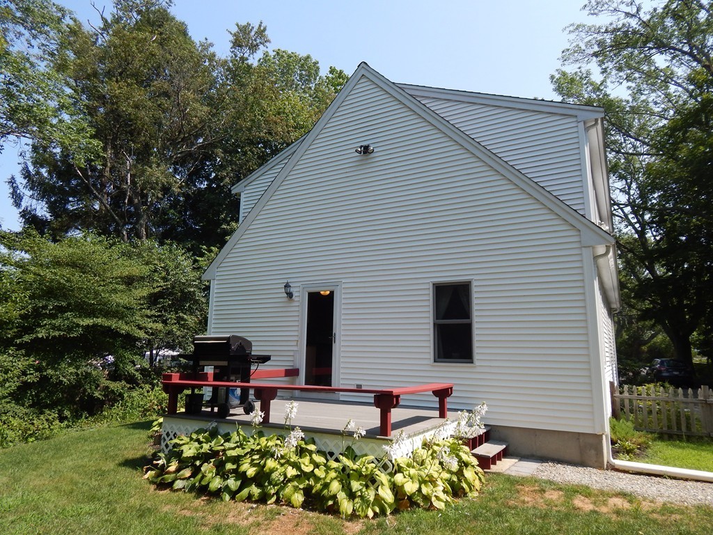 25 Forge Road Freetown, MA 02702 - Photo 19 of 21 a backyard of a house with outdoor seating