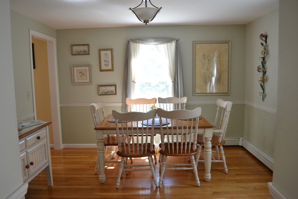 25 Forge Road Freetown, MA 02702 - Photo 5 of 21 a view of a dining room with furniture wooden floor and a chandelier