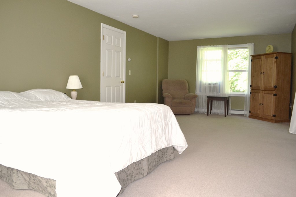 25 Forge Road Freetown, MA 02702 - Photo 10 of 21 a bedroom with a bed and a painting on the wall