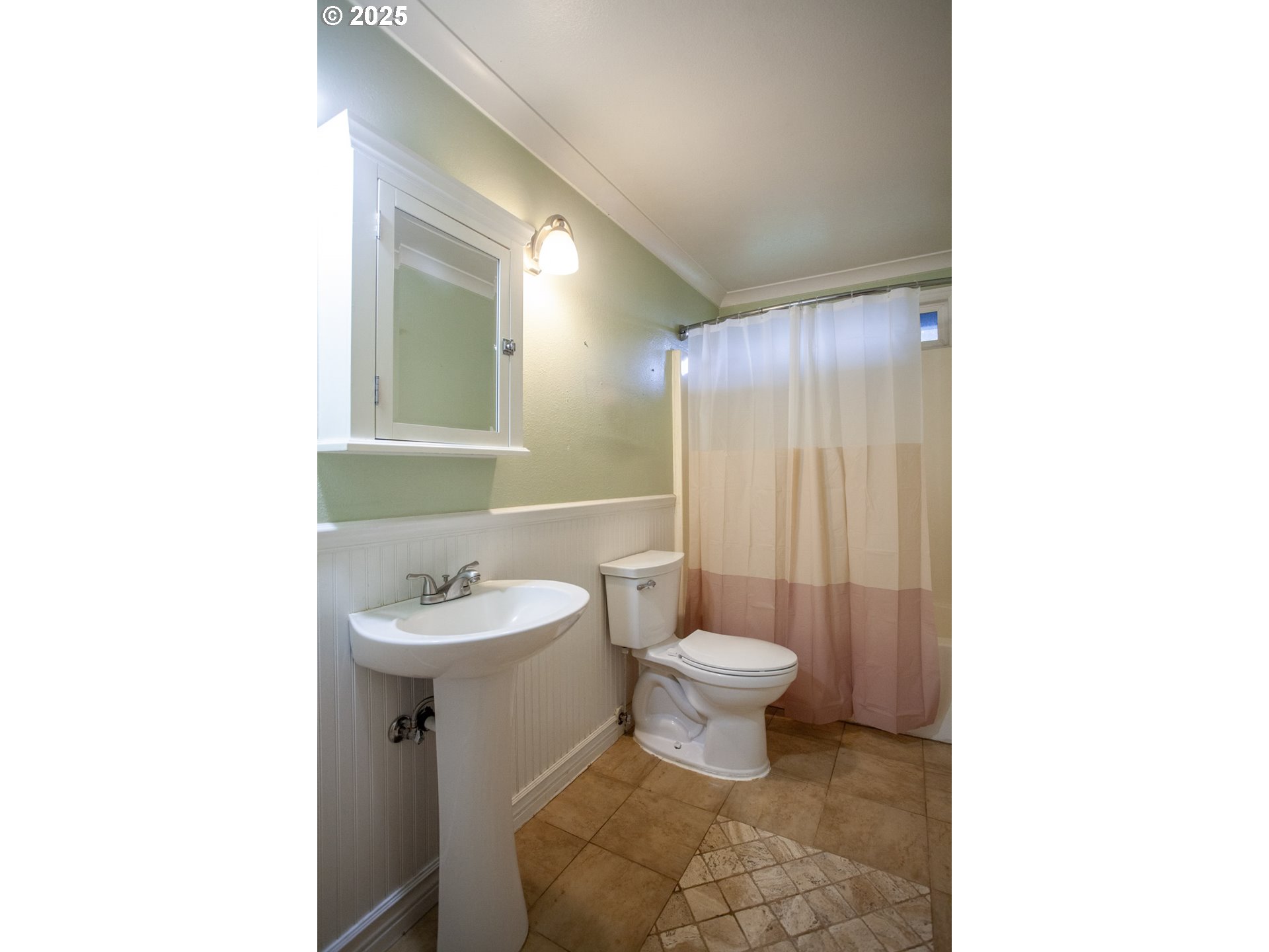 26609 South Elwood Road Colton, OR 97017 - Photo 14 of 38 a bathroom with a sink toilet a mirror and shower