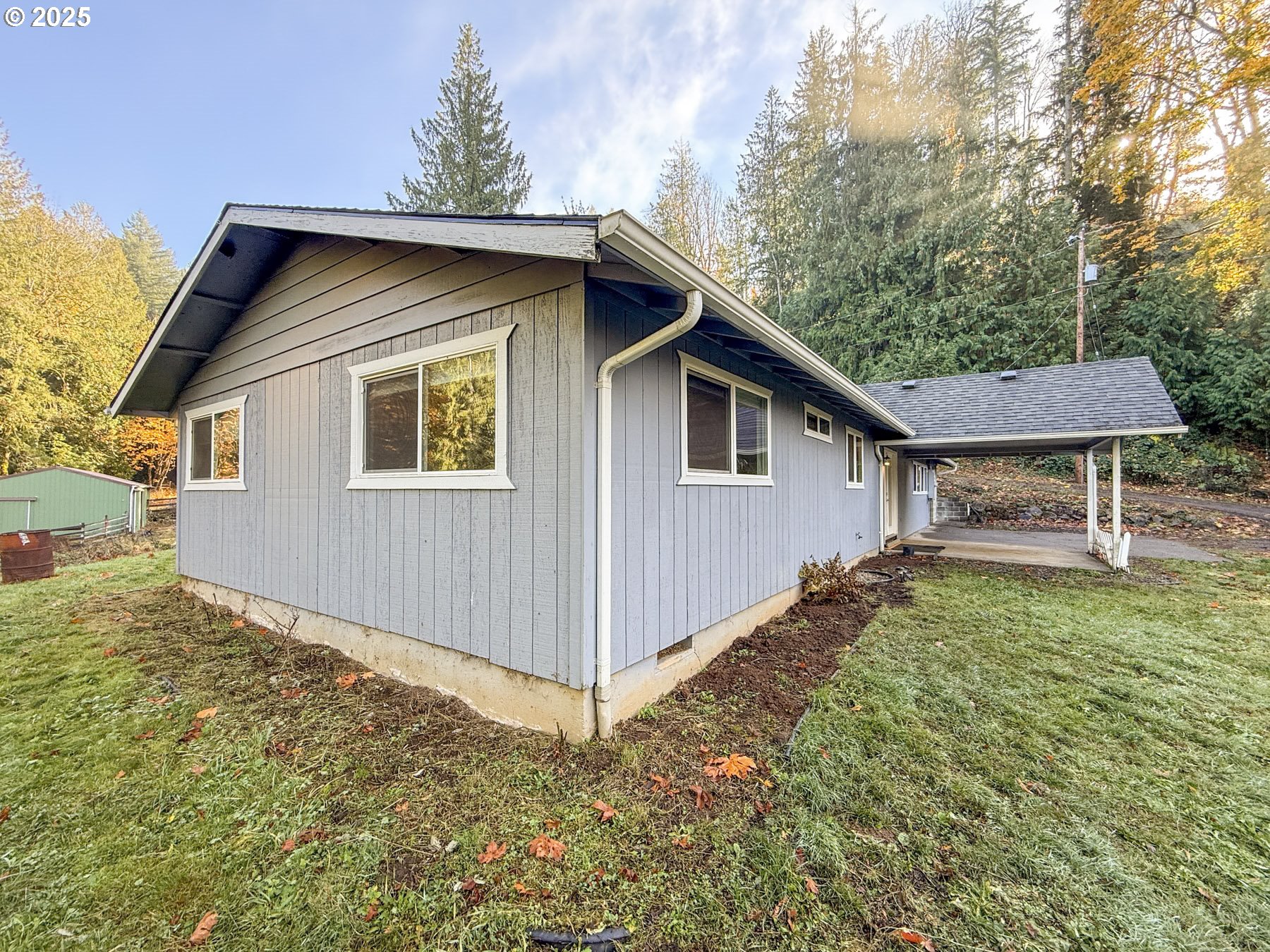 26609 South Elwood Road Colton, OR 97017 - Photo 15 of 38 a house with trees in the background