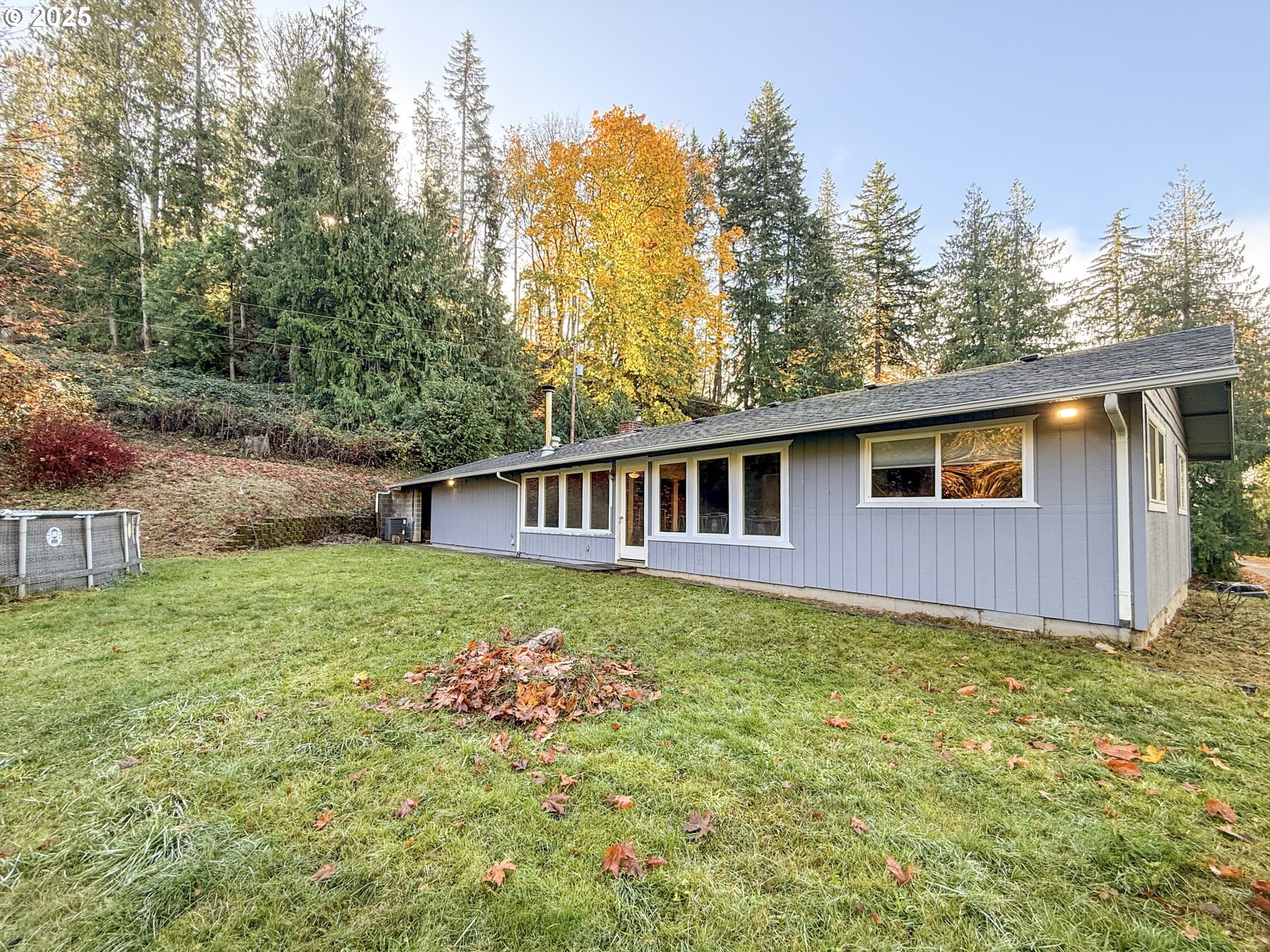 26609 South Elwood Road Colton, OR 97017 - Photo 17 of 38 a backyard of a house with lots of green space