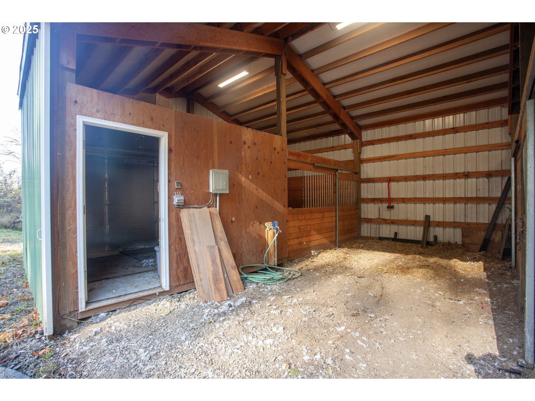 26609 South Elwood Road Colton, OR 97017 - Photo 22 of 38 a view of a room with wooden walls