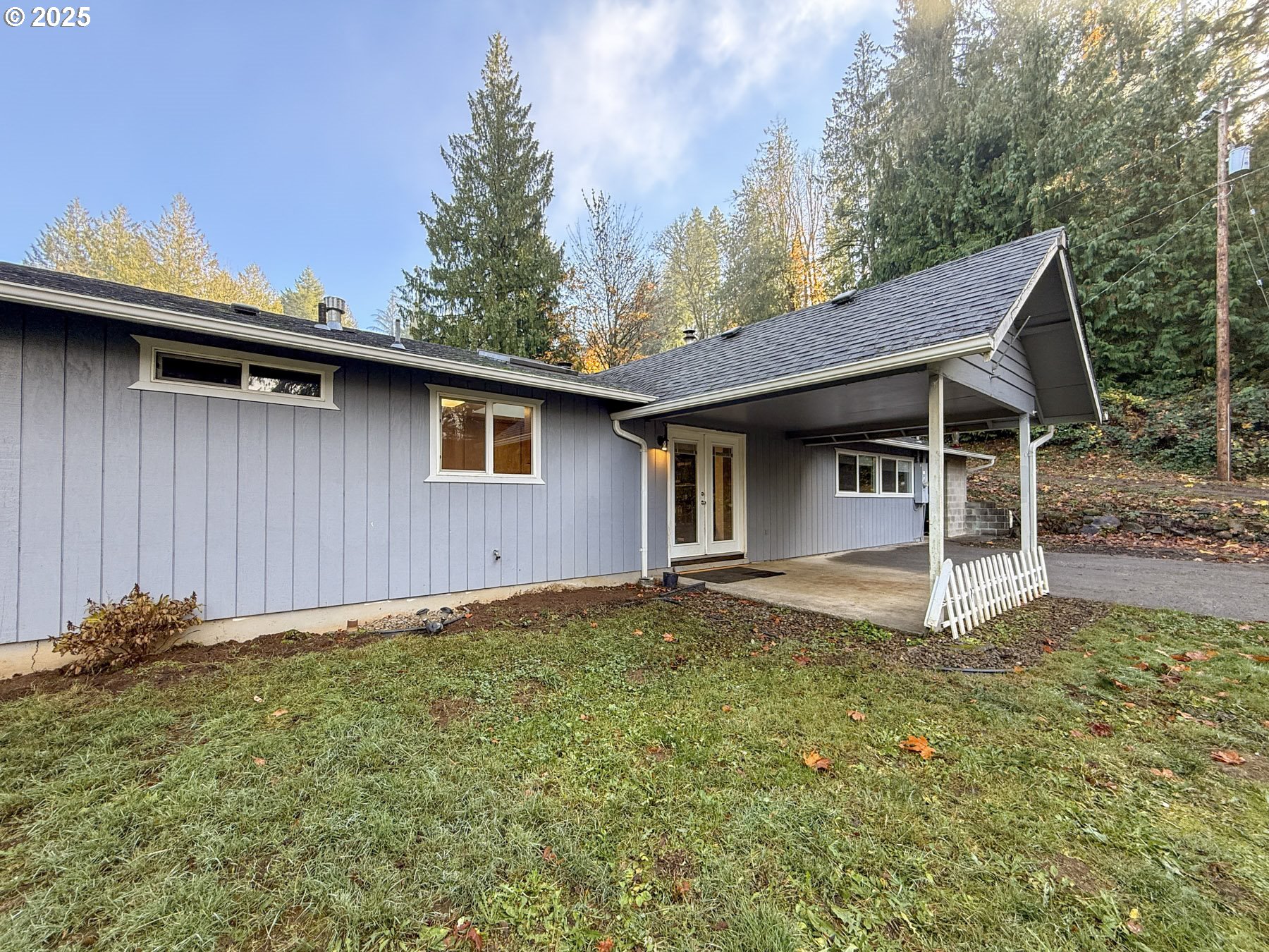 26609 South Elwood Road Colton, OR 97017 - Photo 3 of 38 a house with trees in the background