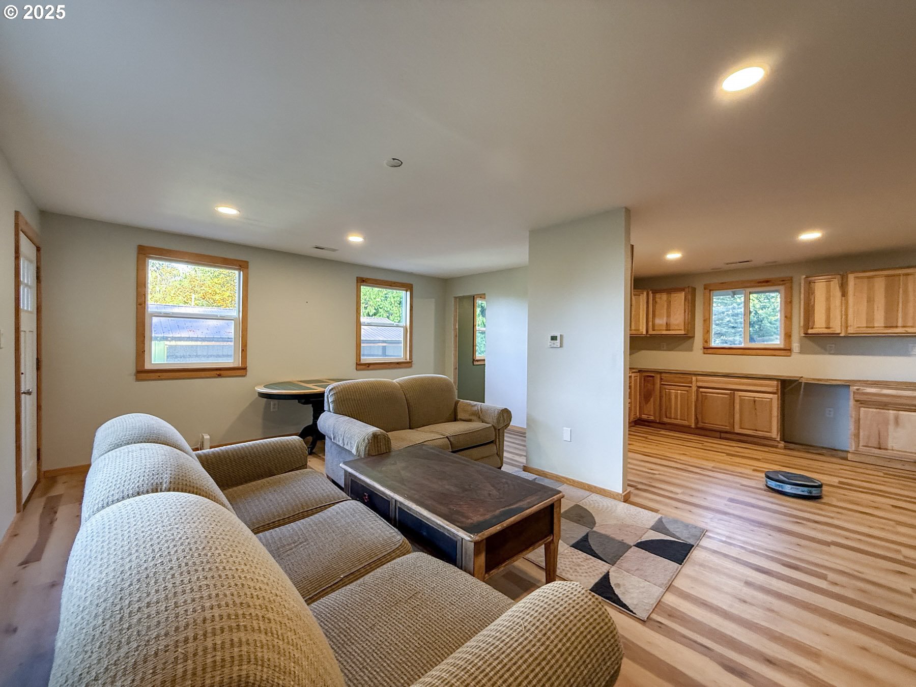 26609 South Elwood Road Colton, OR 97017 - Photo 33 of 38 a living room with furniture and a wooden floor
