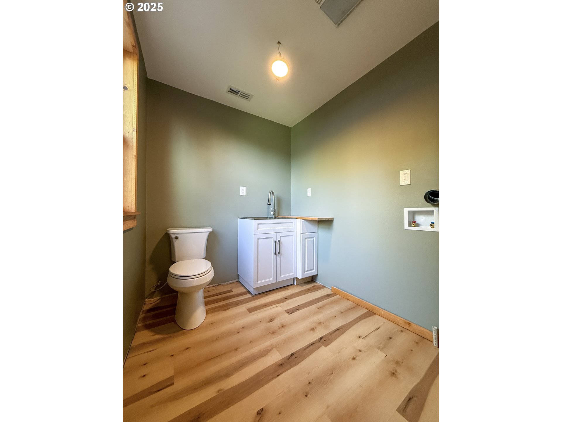 26609 South Elwood Road Colton, OR 97017 - Photo 34 of 38 a bathroom with a sink and a toilet