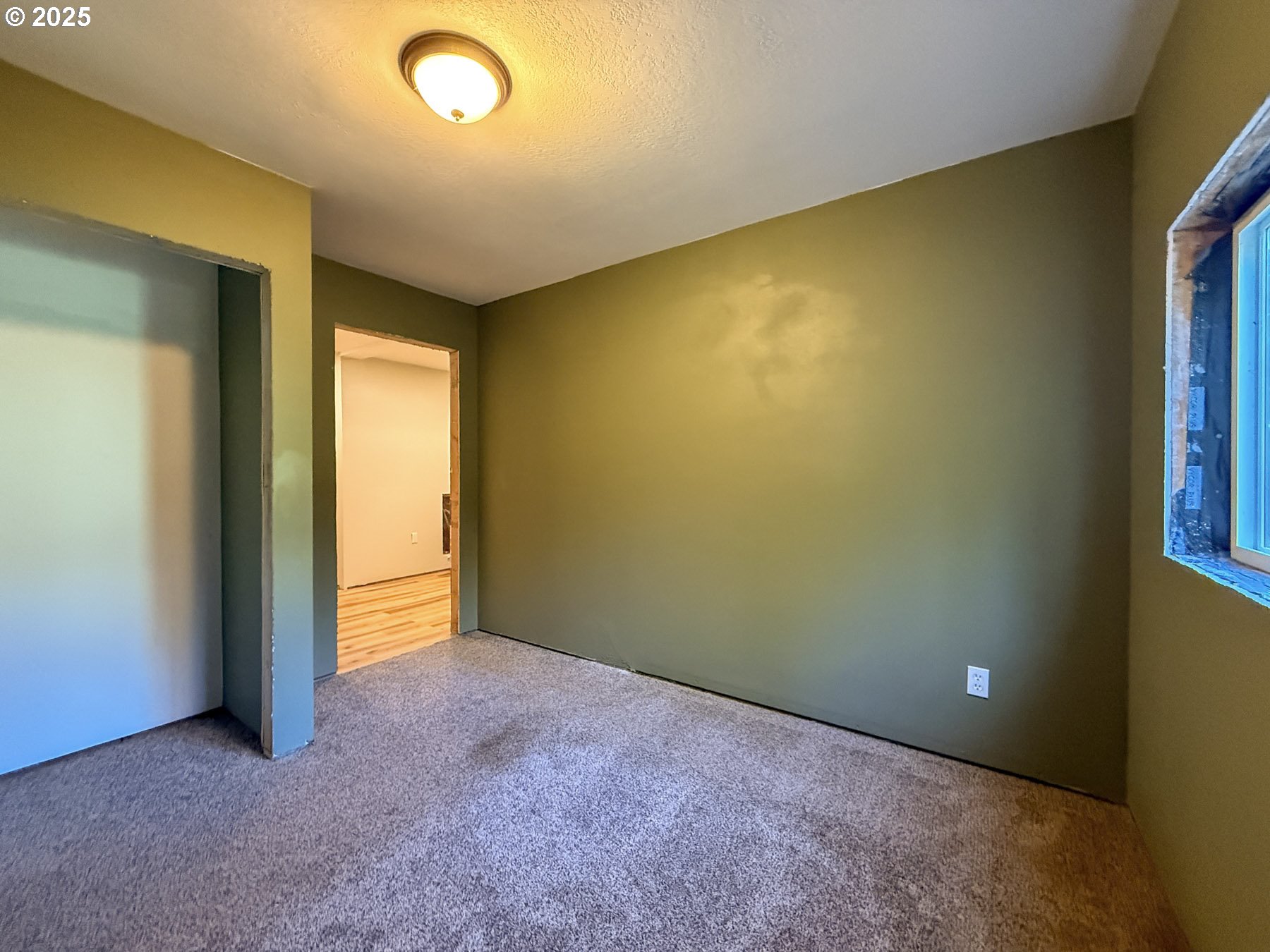26609 South Elwood Road Colton, OR 97017 - Photo 35 of 38 an empty room with a empty space and a window