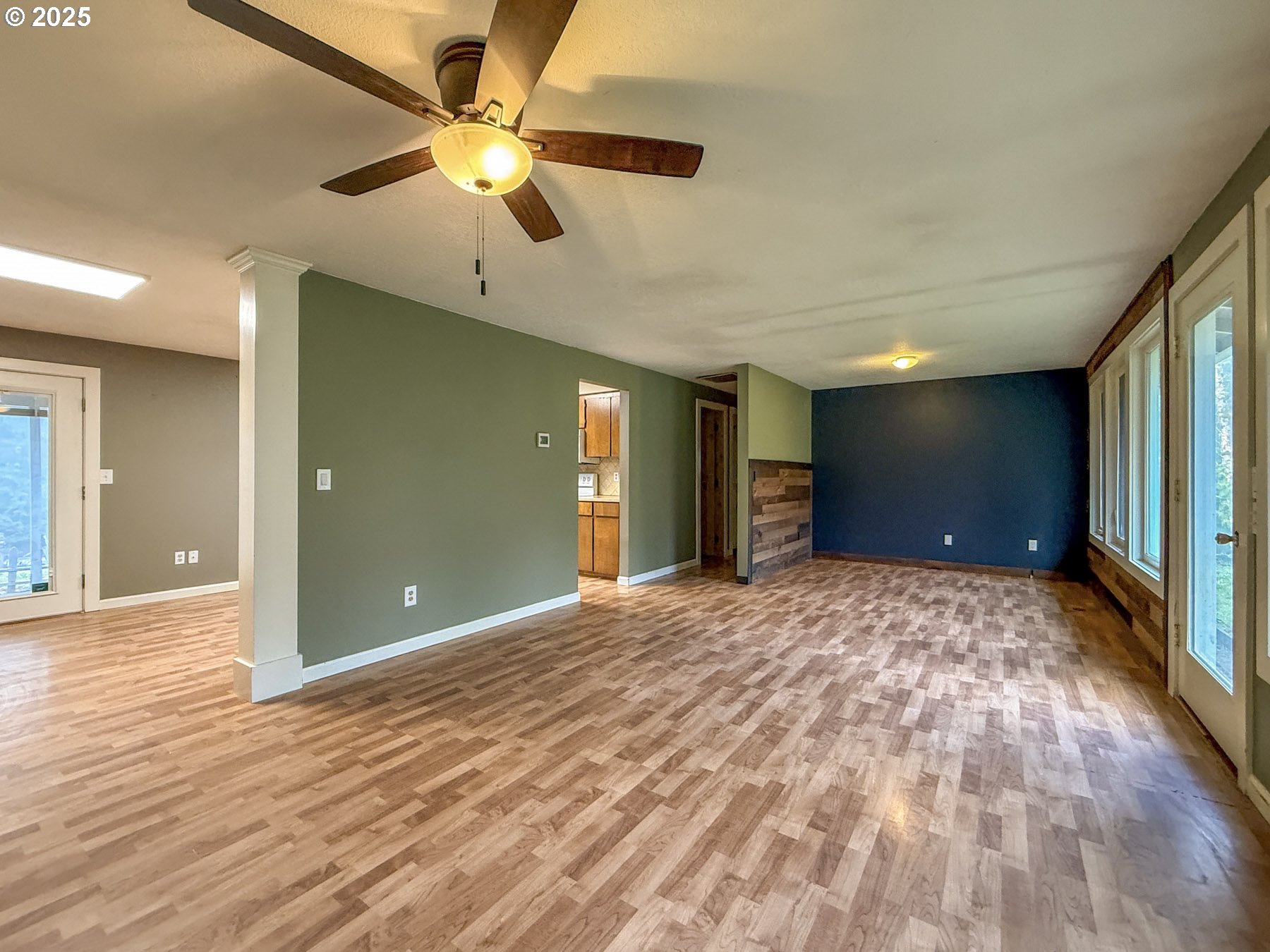 26609 South Elwood Road Colton, OR 97017 - Photo 6 of 38 a view of an empty room and kitchen view