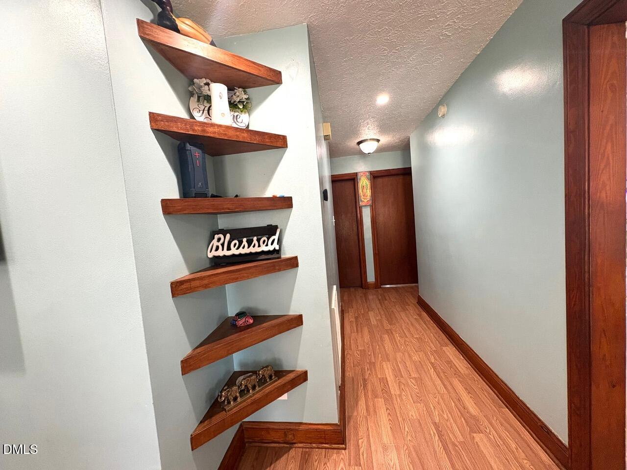 1337 Maple Street Rocky Mount, NC 27803 - Photo 12 of 15 a view of hallway with wooden floor