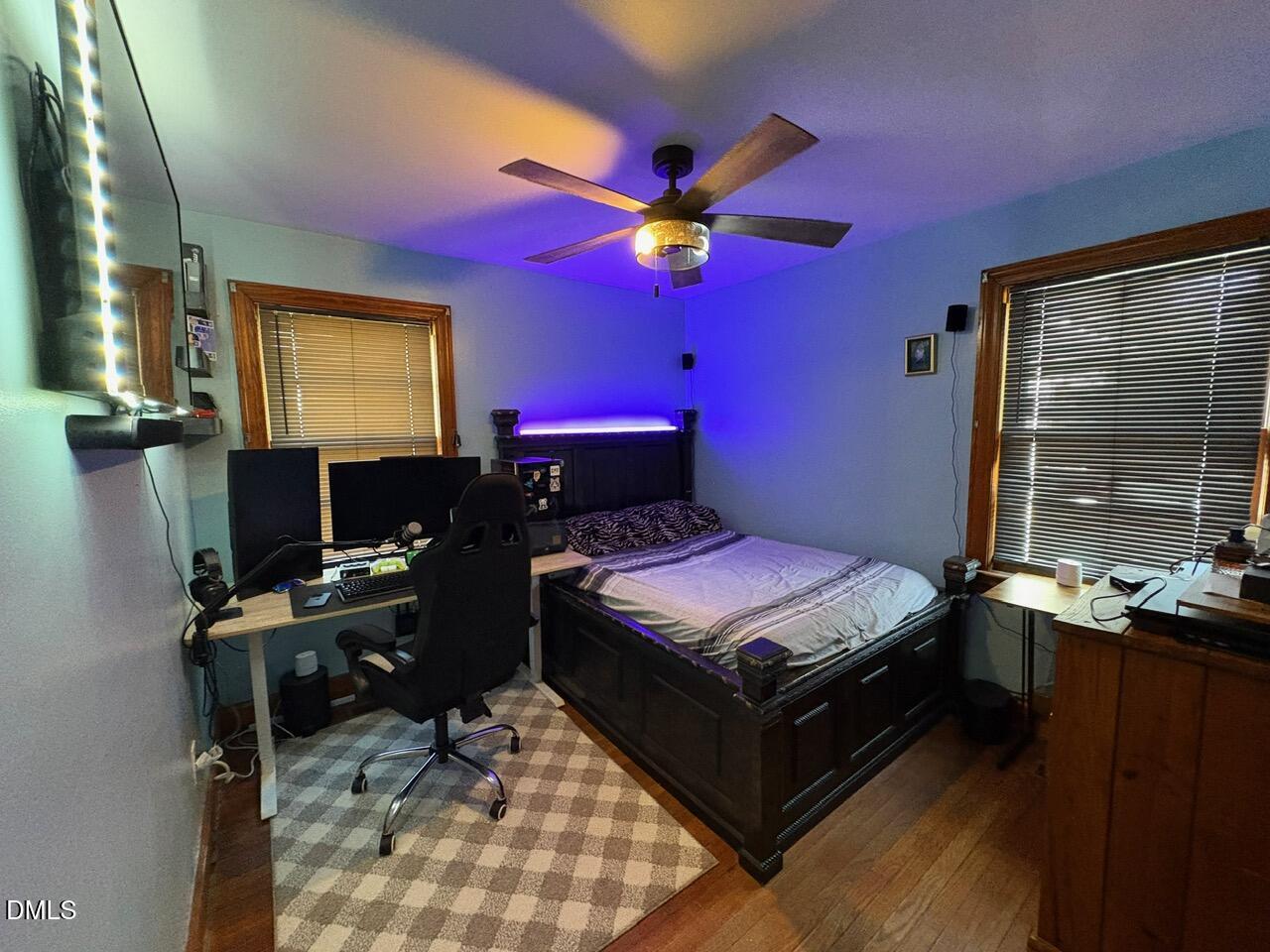 1337 Maple Street Rocky Mount, NC 27803 - Photo 8 of 15 a bedroom with a bed and a window