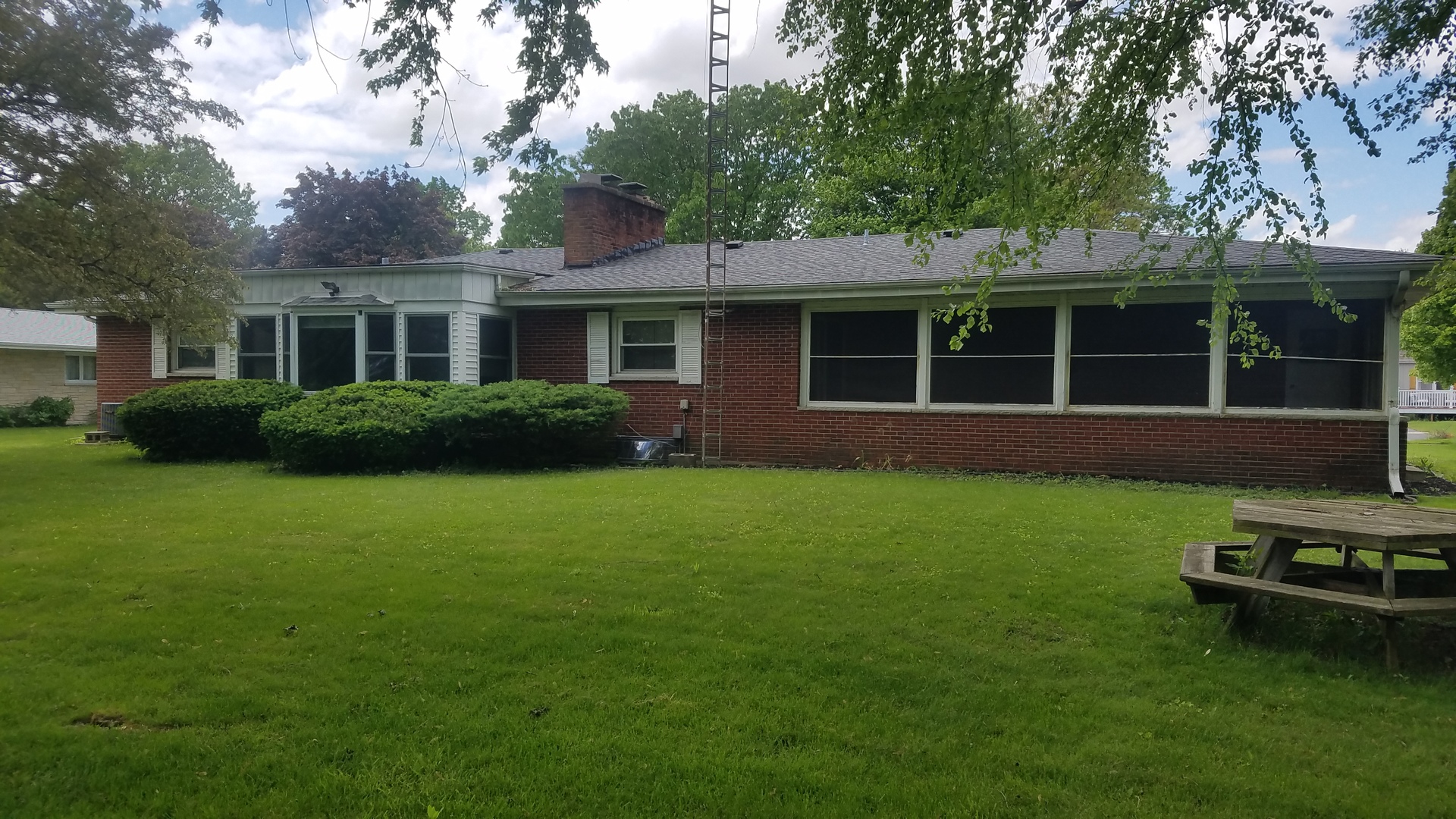 1401 Brookside Drive Rochelle, IL 61068 - Photo 2 of 20 a house view with a garden space