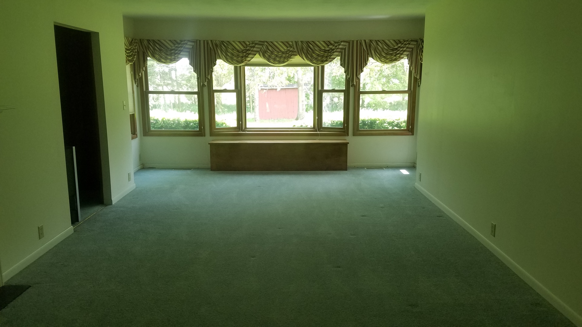 1401 Brookside Drive Rochelle, IL 61068 - Photo 6 of 20 a view of an empty room with a window