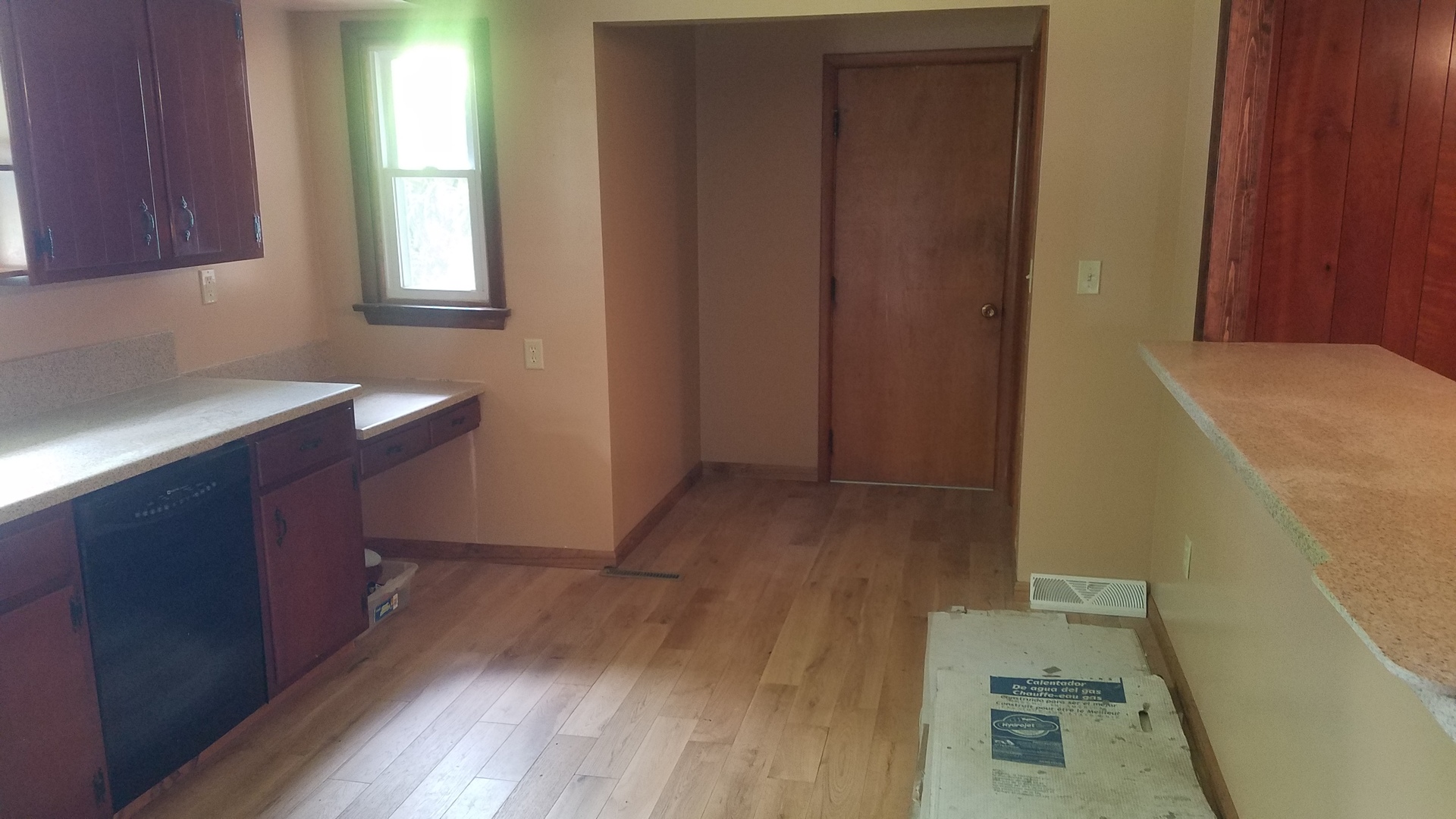 1401 Brookside Drive Rochelle, IL 61068 - Photo 7 of 20 a view of a kitchen with wooden floor and staircase
