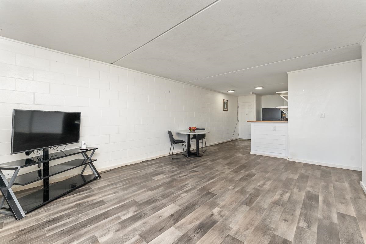 111 Kahului Beach Road, Unit A104 Kahului, HI 96732 - Photo 14 of 38 a view of a livingroom with furniture and a flat screen tv