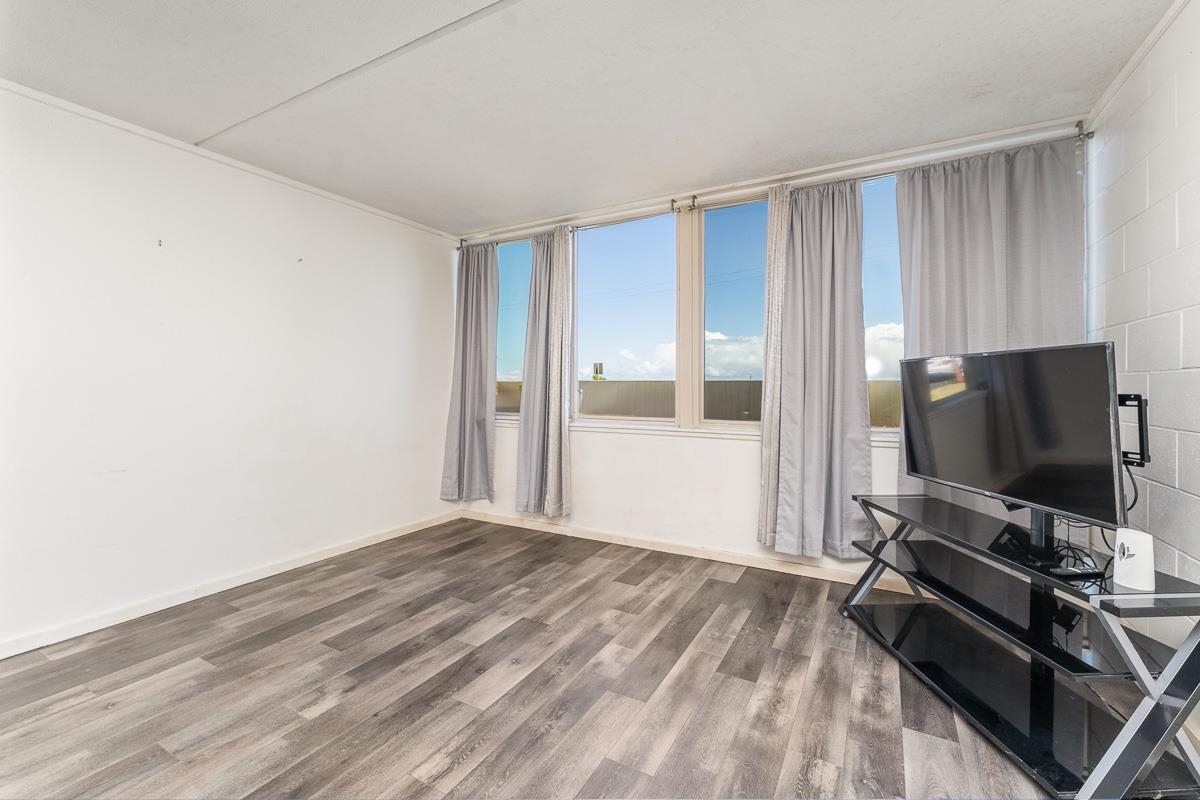 111 Kahului Beach Road, Unit A104 Kahului, HI 96732 - Photo 15 of 38 a room with a bed and a flat screen tv