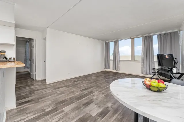 a view of kitchen island wooden floor