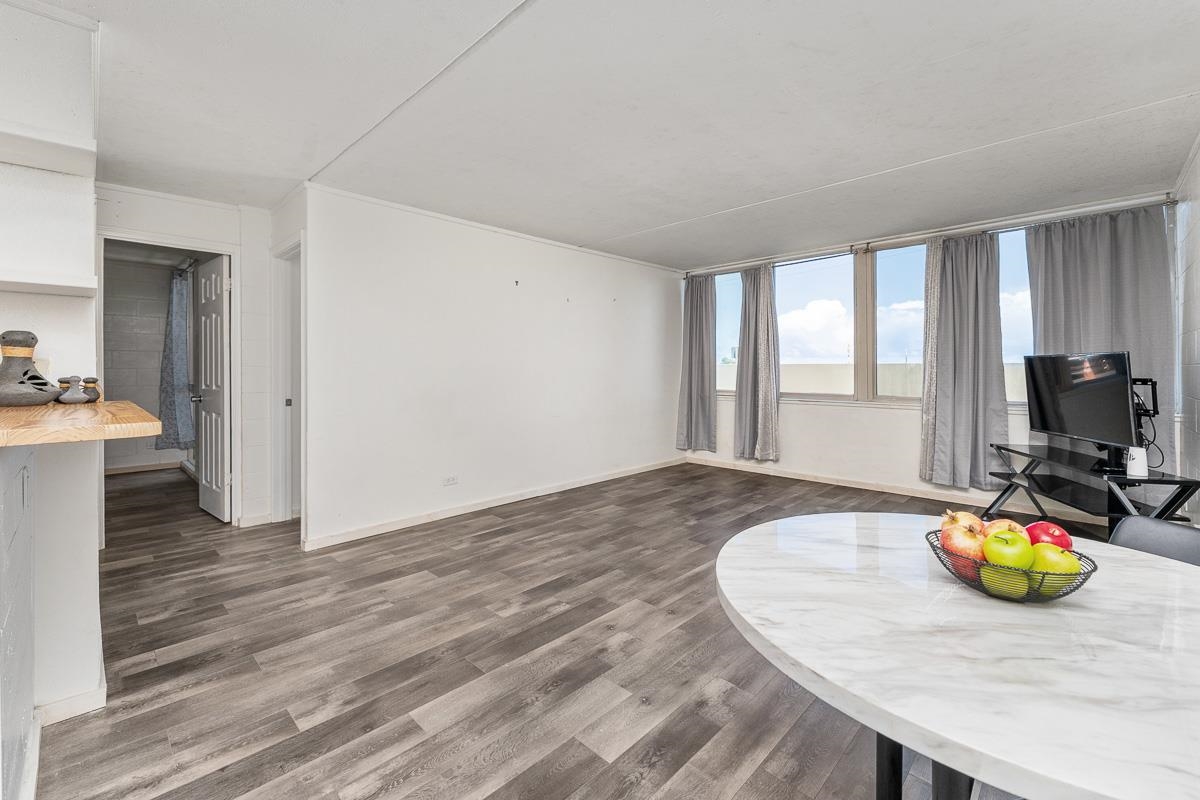 111 Kahului Beach Road, Unit A104 Kahului, HI 96732 - Photo 17 of 38 a view of kitchen island wooden floor