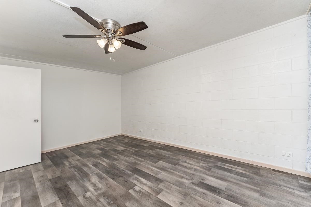 111 Kahului Beach Road, Unit A104 Kahului, HI 96732 - Photo 31 of 38 a view of an empty room with wooden floor