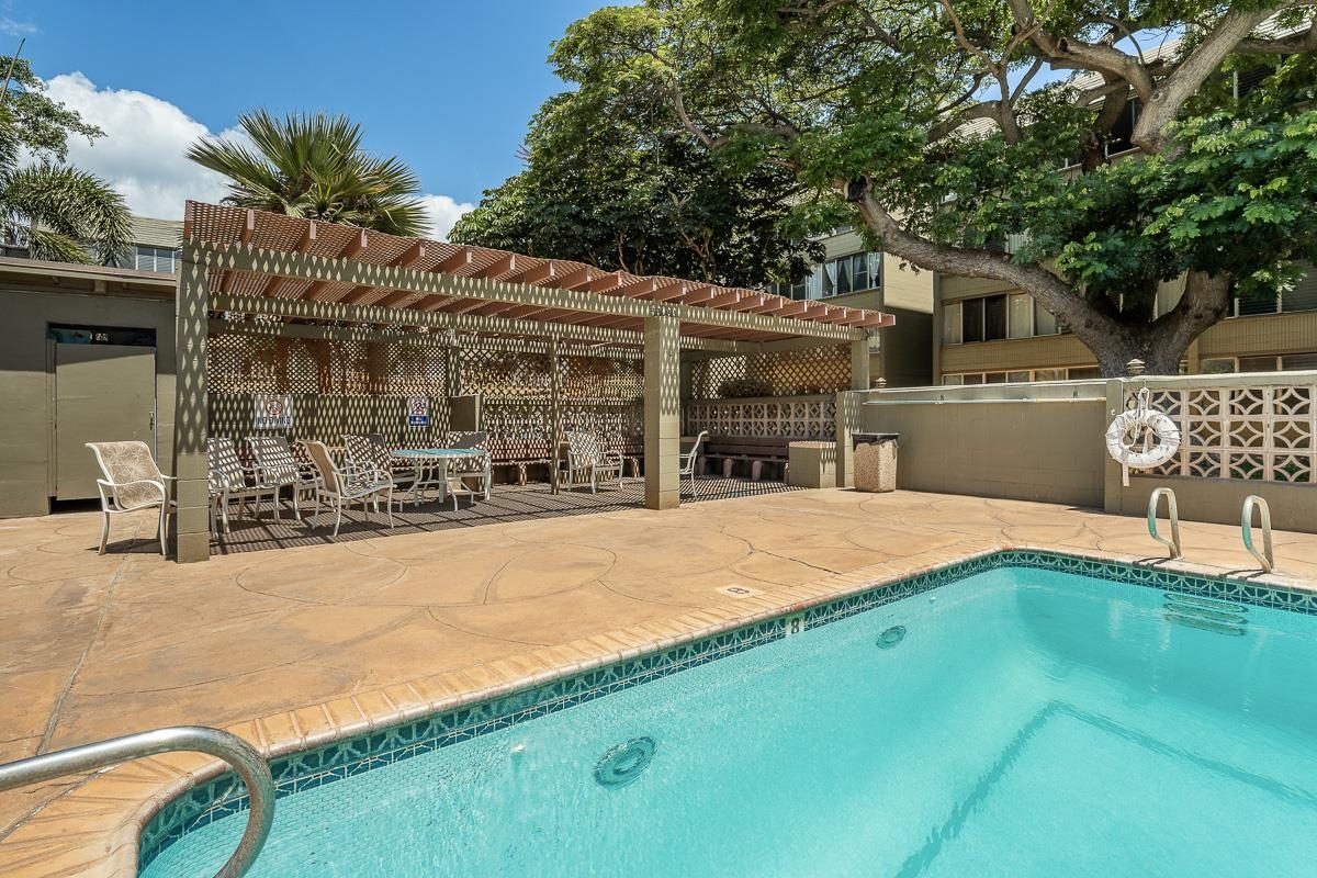 111 Kahului Beach Road, Unit A104 Kahului, HI 96732 - Photo 35 of 38 a view of a house with a yard