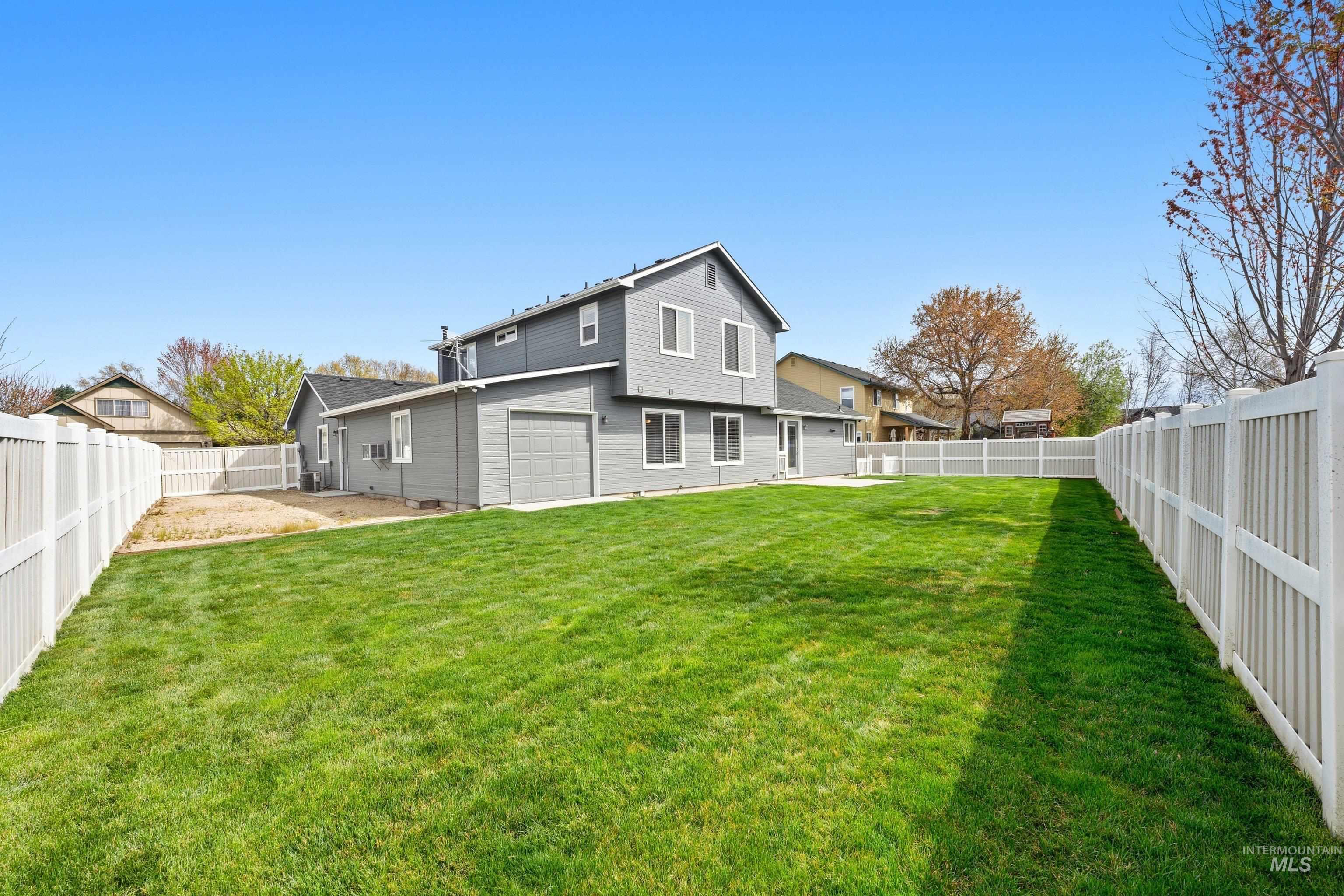 3787 North Alexis Way Meridian, ID 83646 - Photo 41 of 50 Back of property with a fenced backyard