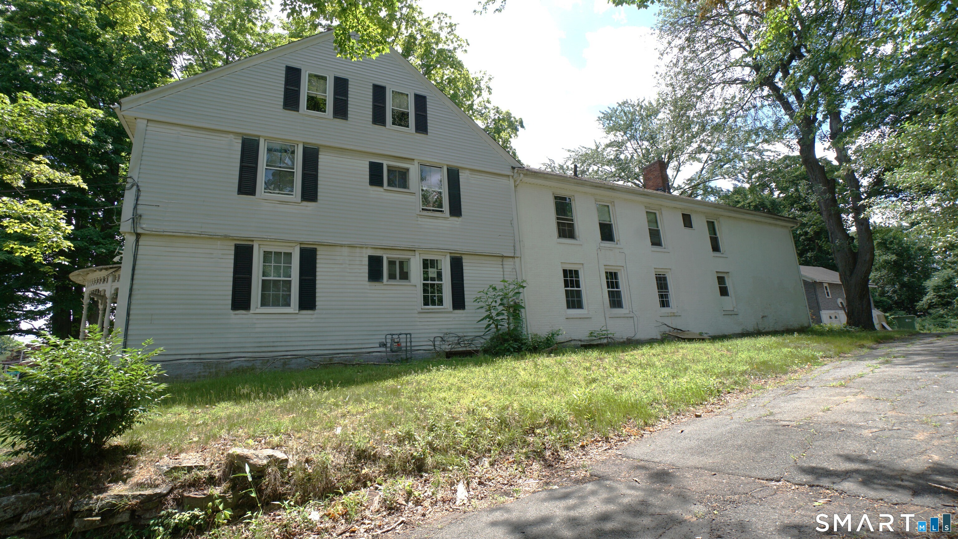 245 Deerfield Road Windsor, CT 06095 - Photo 2 of 27 The Rear apartment is on two levels, 2,200 square feet with 3 bdrms and 2 baths. May be divided into two units.