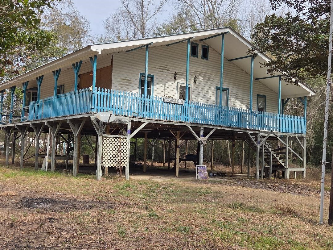 a front view of a house with parking