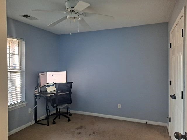 4356 Cedar Hills Road Memphis, TN 38135 - Photo 14 of 18 a workspace with furniture and a window