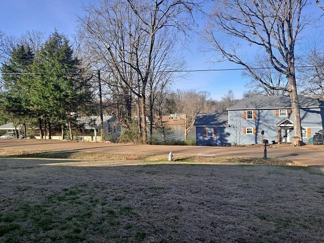 4356 Cedar Hills Road Memphis, TN 38135 - Photo 18 of 18 a view of street with large trees