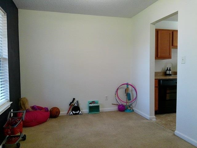 4356 Cedar Hills Road Memphis, TN 38135 - Photo 3 of 18 a room with toys and a table