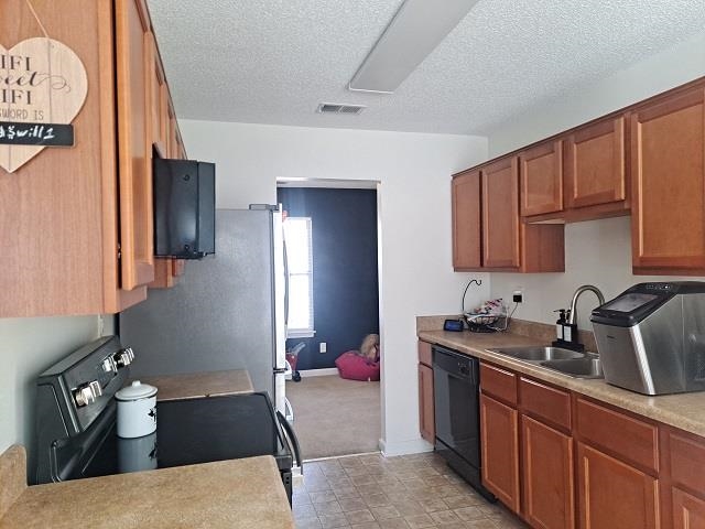 4356 Cedar Hills Road Memphis, TN 38135 - Photo 4 of 18 a kitchen with a sink and cabinets