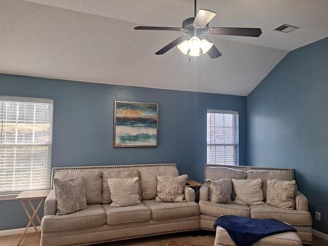 4356 Cedar Hills Road Memphis, TN 38135 - Photo 8 of 18 a living room with furniture and a large window