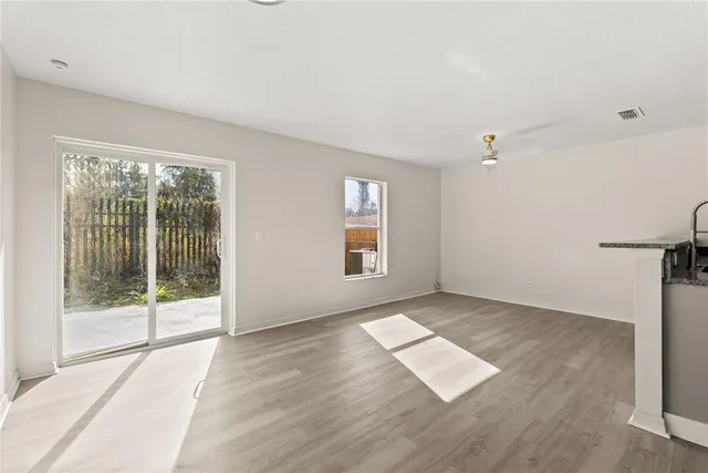 an empty room with windows