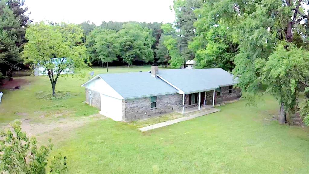 3514 Buchanan Loop Road Texarkana, TX 75501 - Photo 37 of 38 an aerial view of a house with swimming pool and garden
