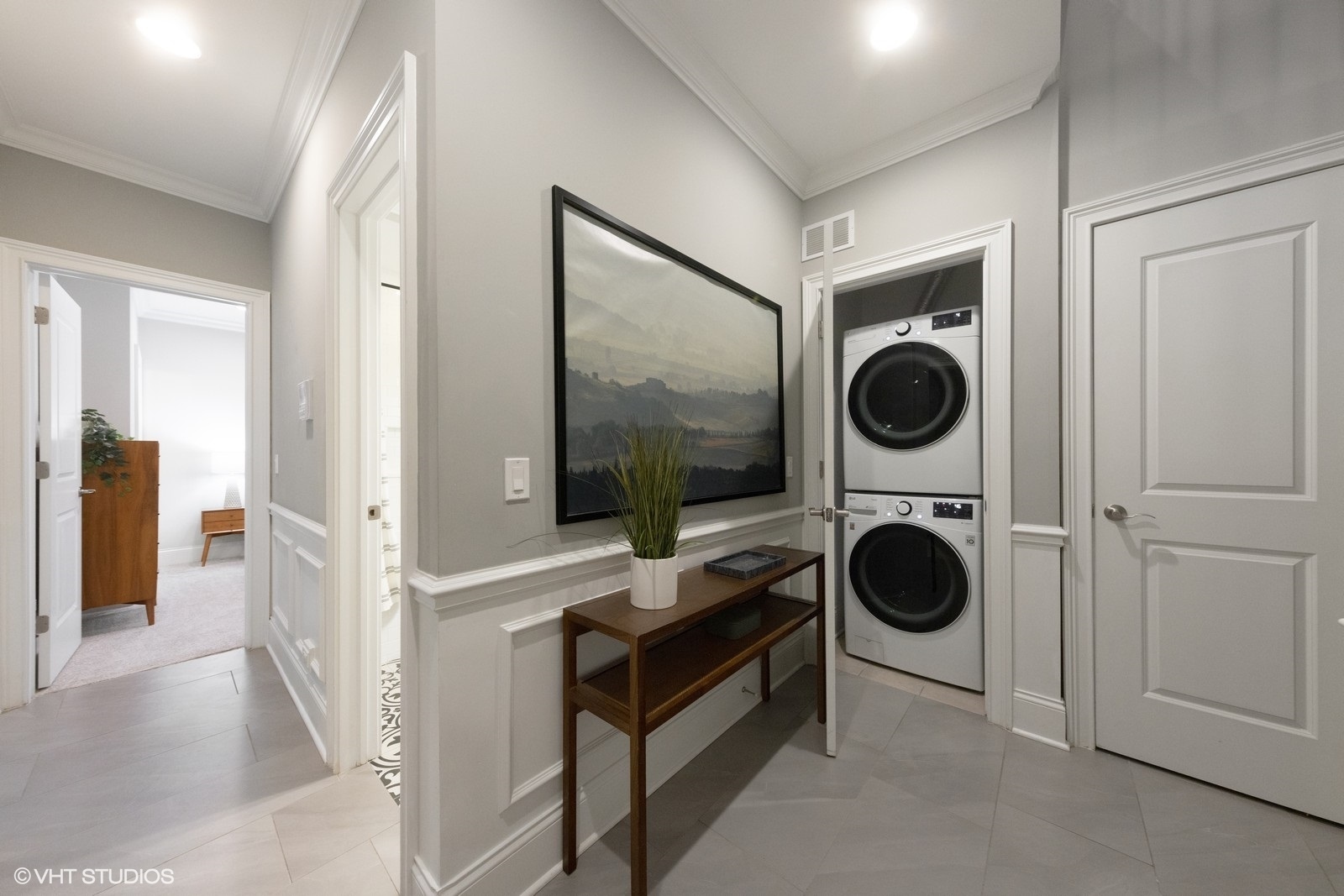 1833 West Addison Street, Unit 1S Chicago, IL 60613 - Photo 11 of 21 a view of a hallway with washer and dryer