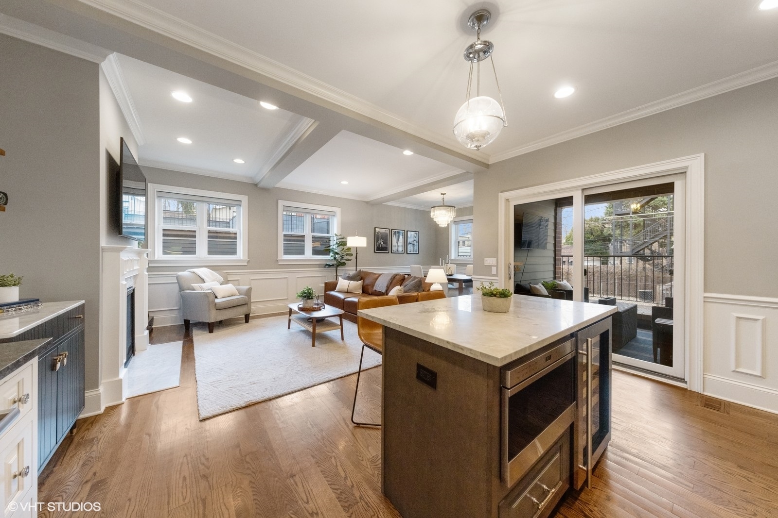 1833 West Addison Street, Unit 1S Chicago, IL 60613 - Photo 7 of 21 a room with furniture and a large window