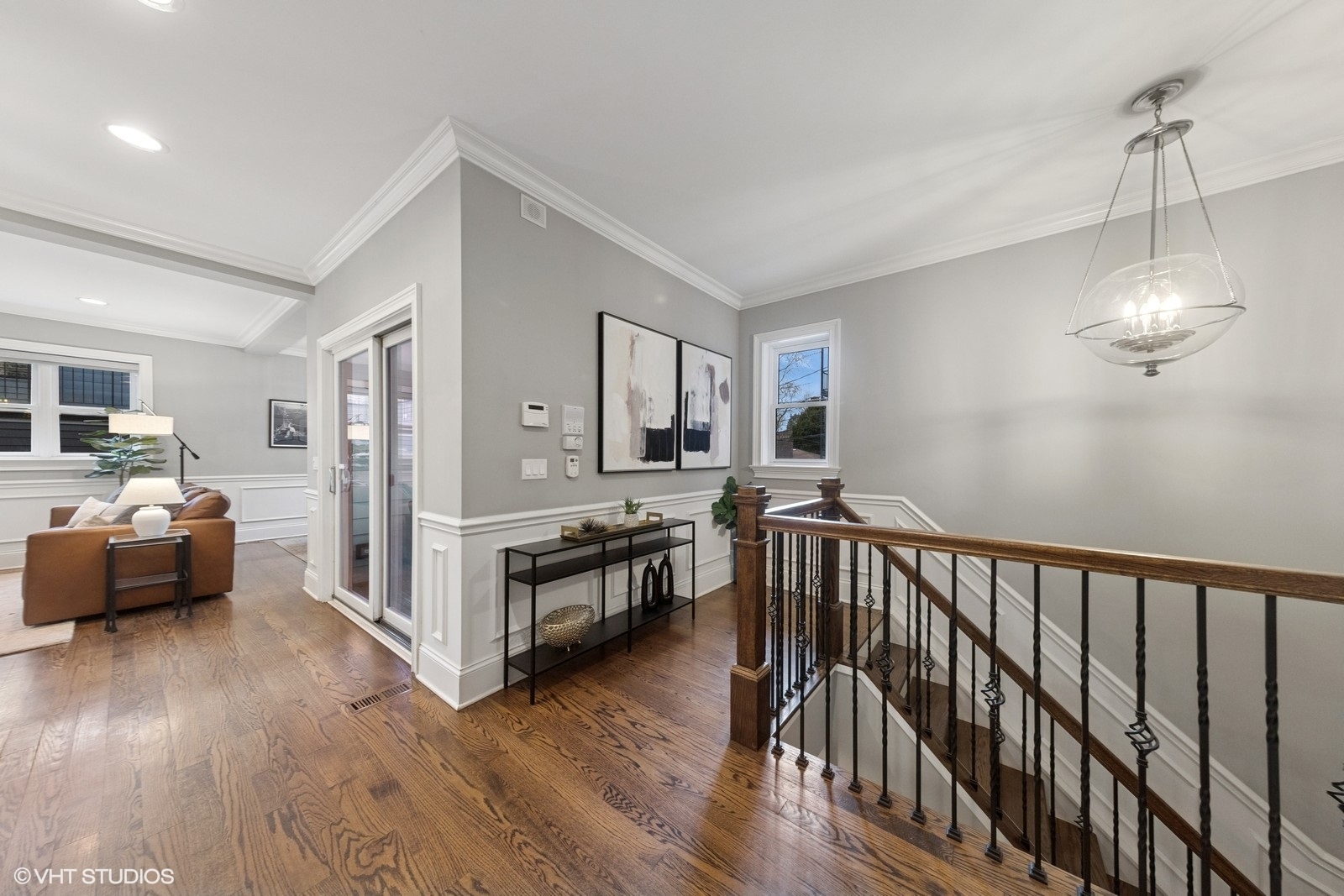 1833 West Addison Street, Unit 1S Chicago, IL 60613 - Photo 9 of 21 a living room with furniture and a wooden floor