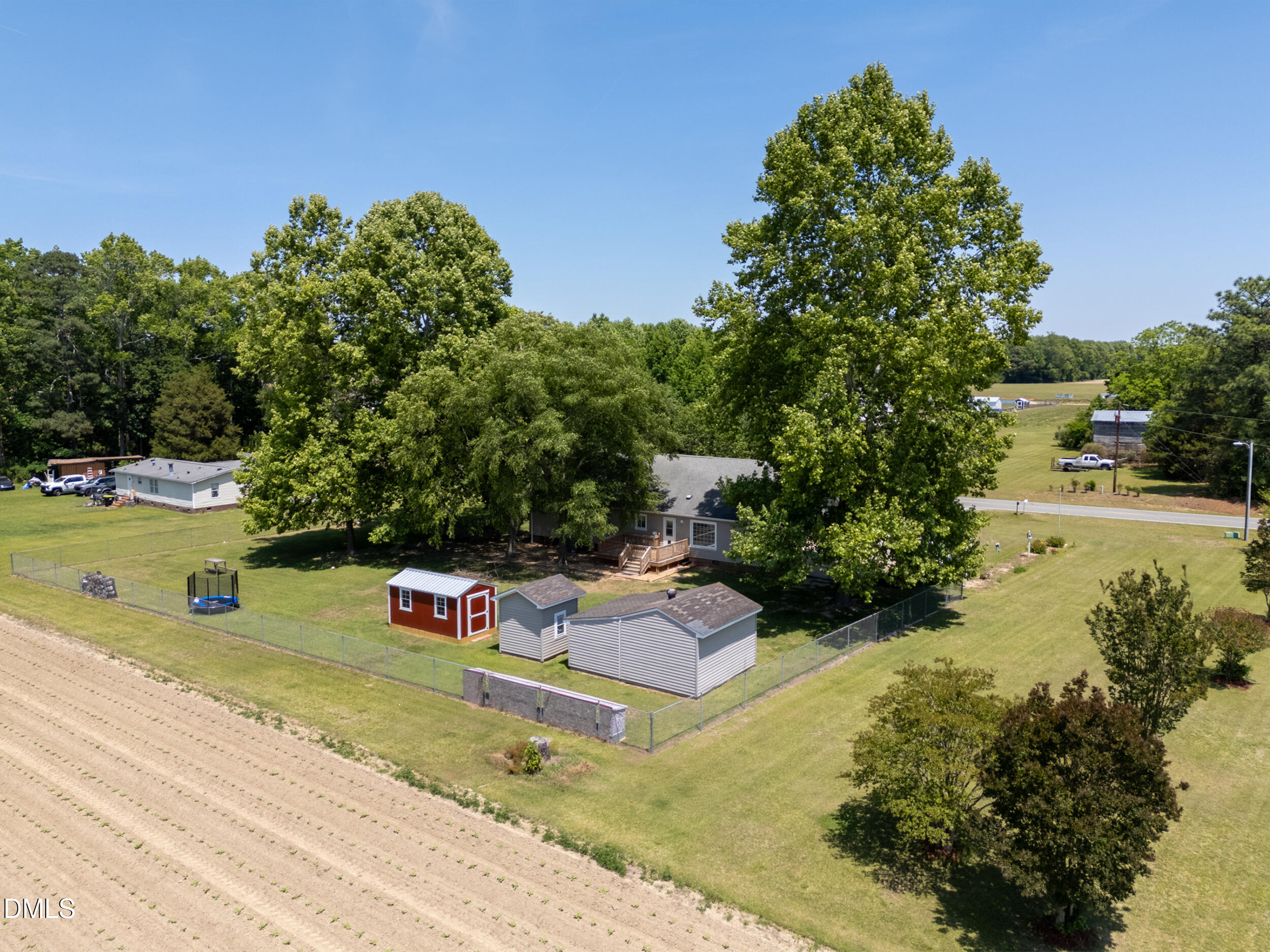 311 Bridgers Road Kenly, NC 27542 - Photo 36 of 46 an aerial view of a house with yard basket ball court and outdoor seating