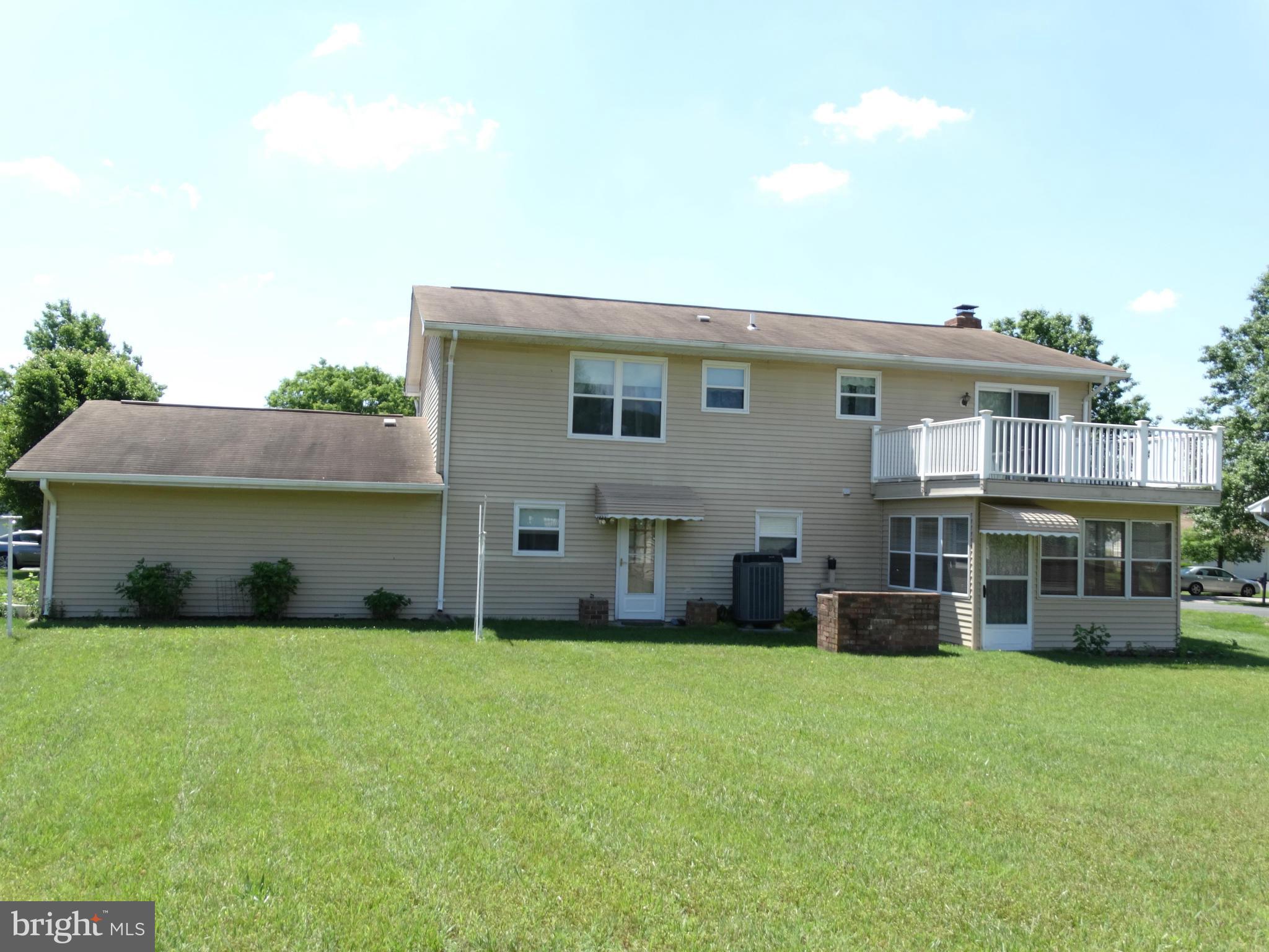 8204 Grainfield Road Severn, MD 21144 - Photo 3 of 30 a house view with a garden space