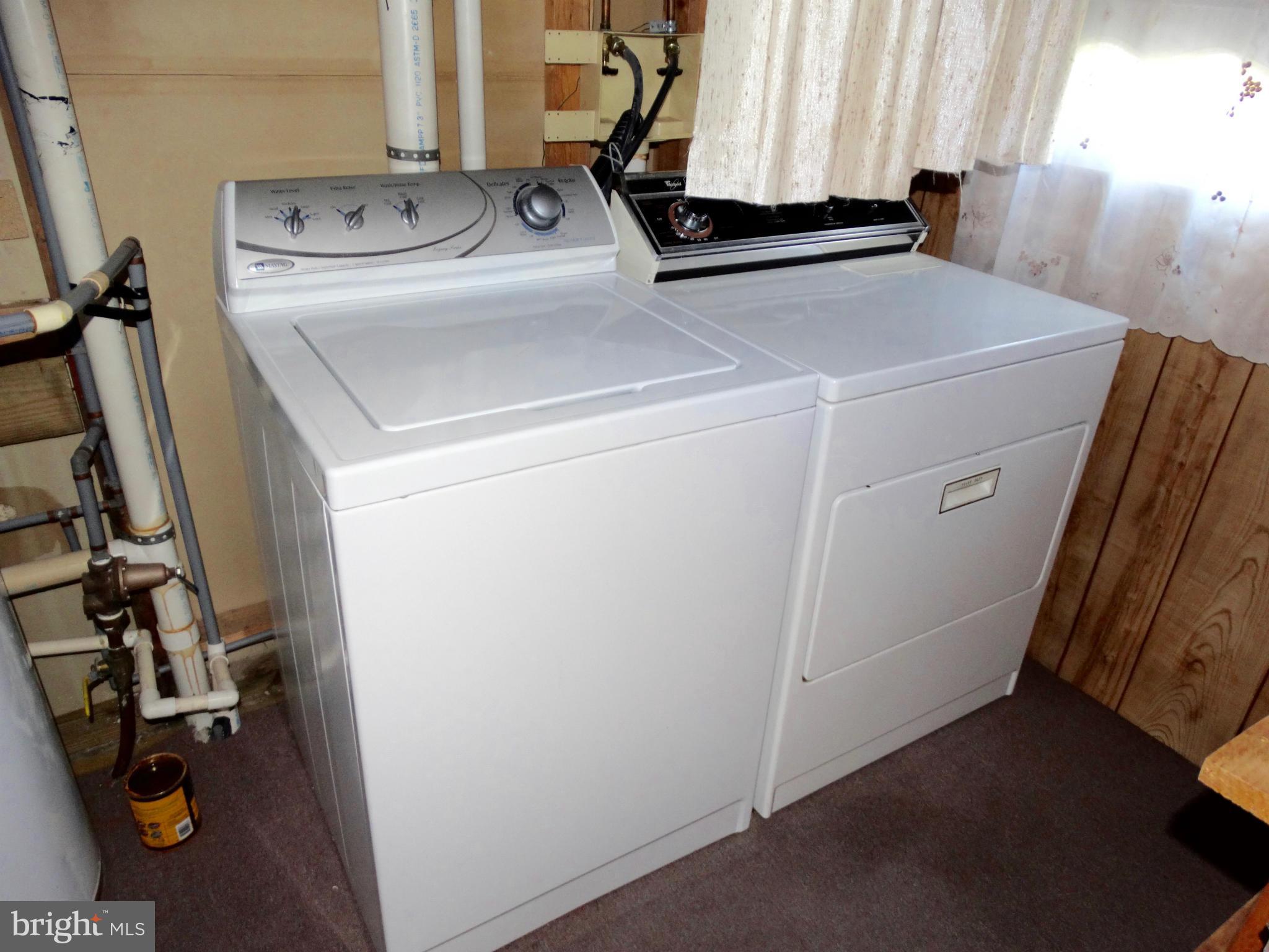 8204 Grainfield Road Severn, MD 21144 - Photo 22 of 30 a utility room with dryer and washer