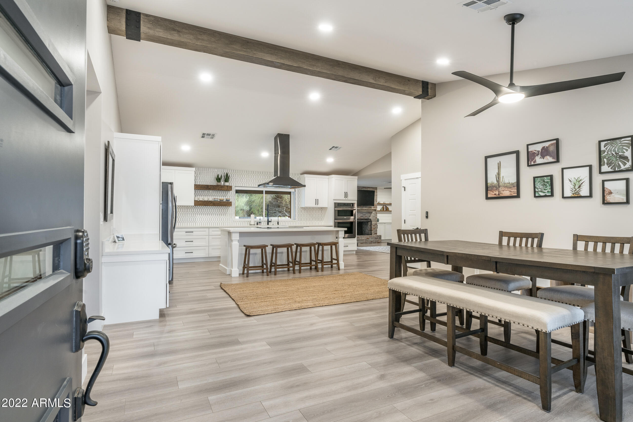 1641 West Evans Drive Phoenix, AZ 85023 - Photo 14 of 52 a living room with stainless steel appliances kitchen island granite countertop furniture and a kitchen view