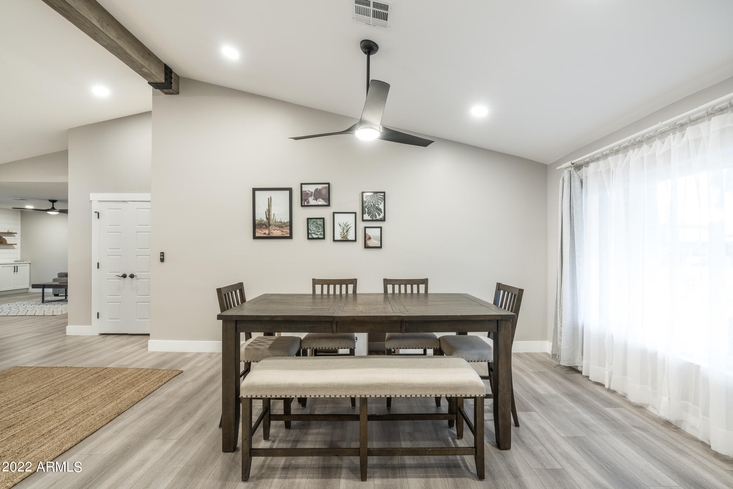 1641 West Evans Drive Phoenix, AZ 85023 - Photo 15 of 52 a view of a dining room with furniture