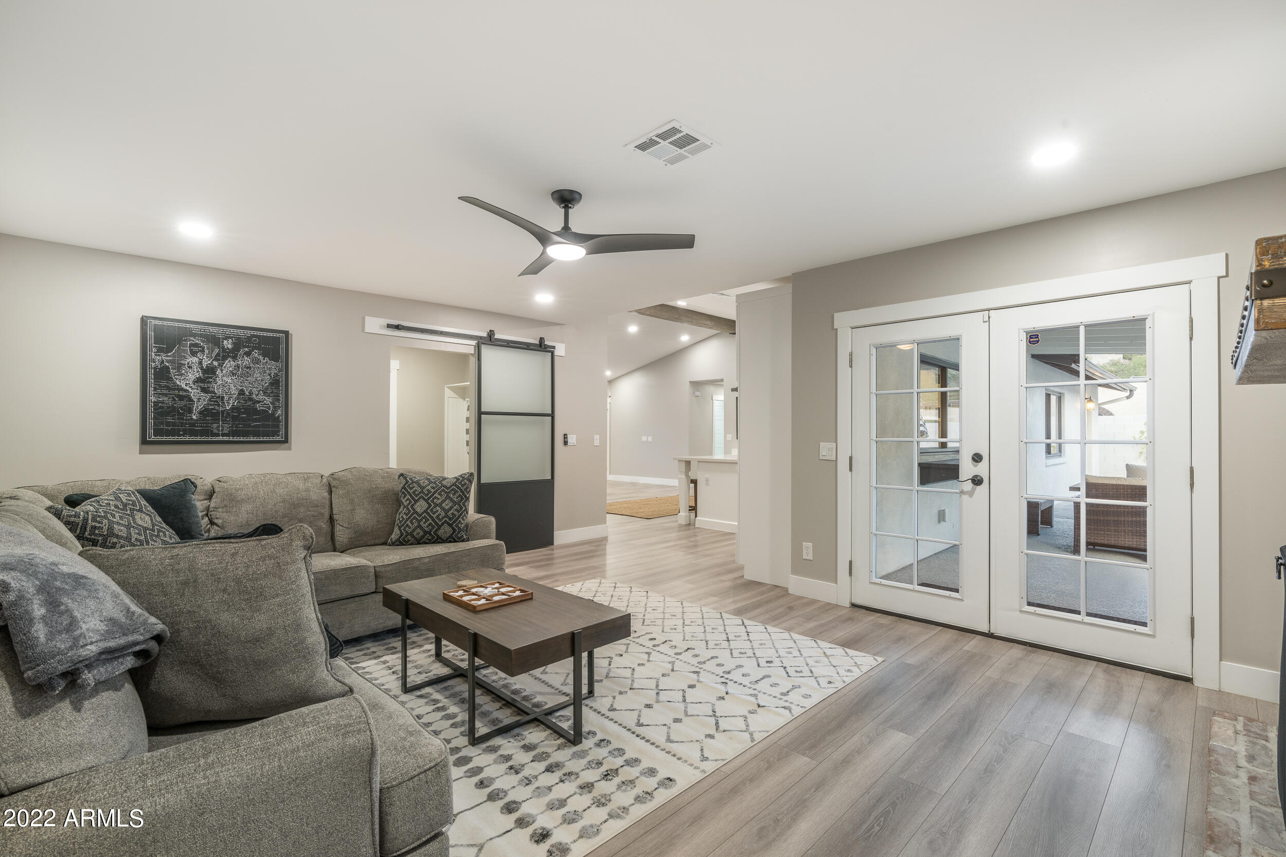 1641 West Evans Drive Phoenix, AZ 85023 - Photo 24 of 52 a living room with furniture and a rug