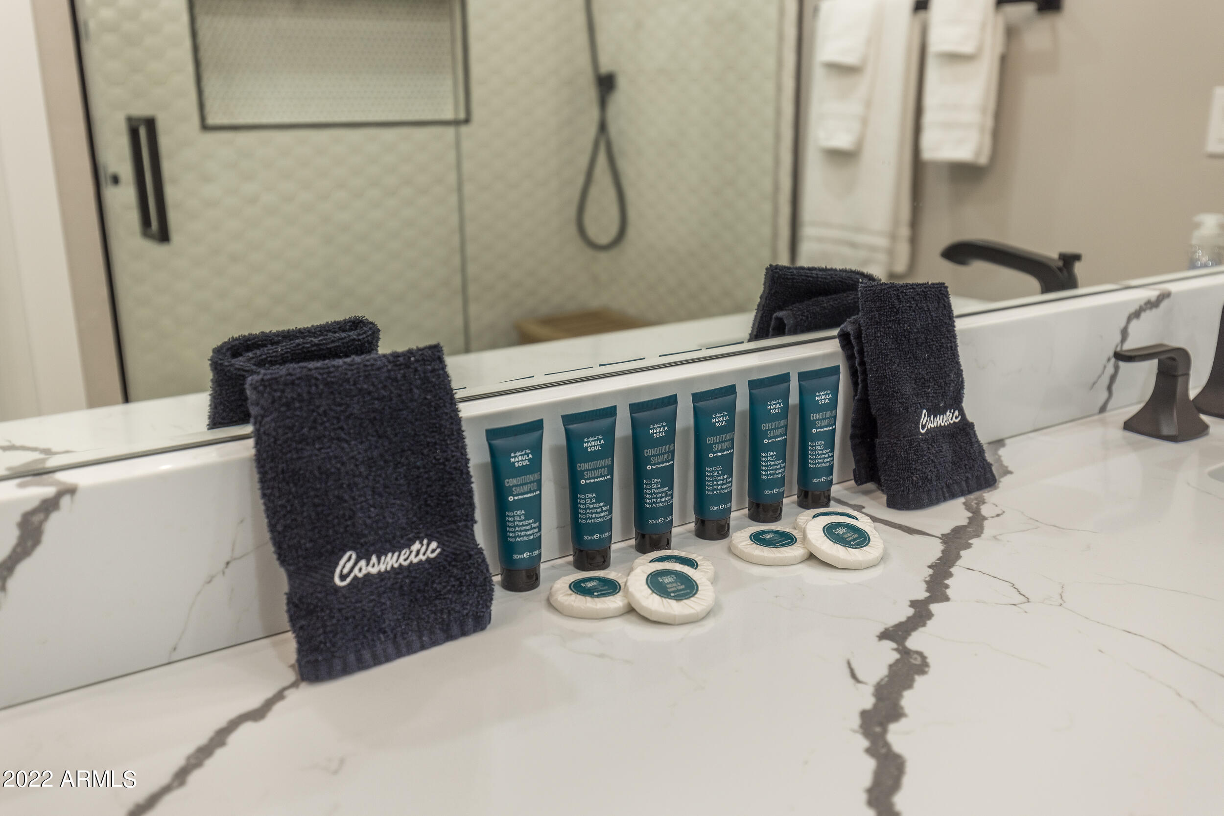 1641 West Evans Drive Phoenix, AZ 85023 - Photo 38 of 52 a bathroom with a sink and mirror