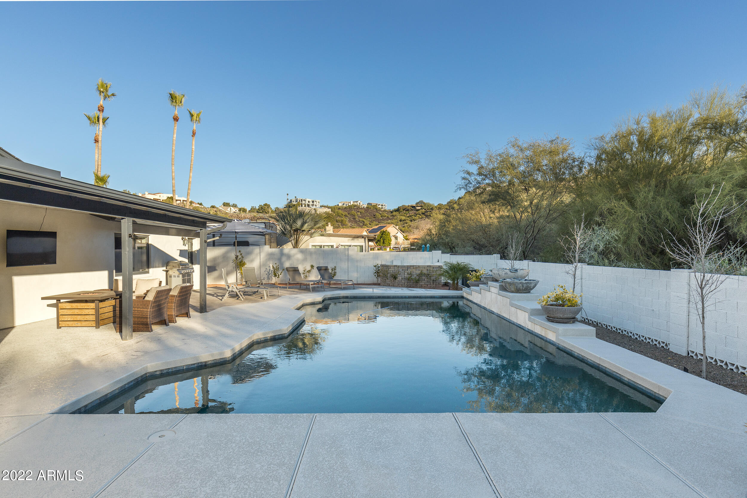 1641 West Evans Drive Phoenix, AZ 85023 - Photo 45 of 52 a view of a swimming pool with a patio