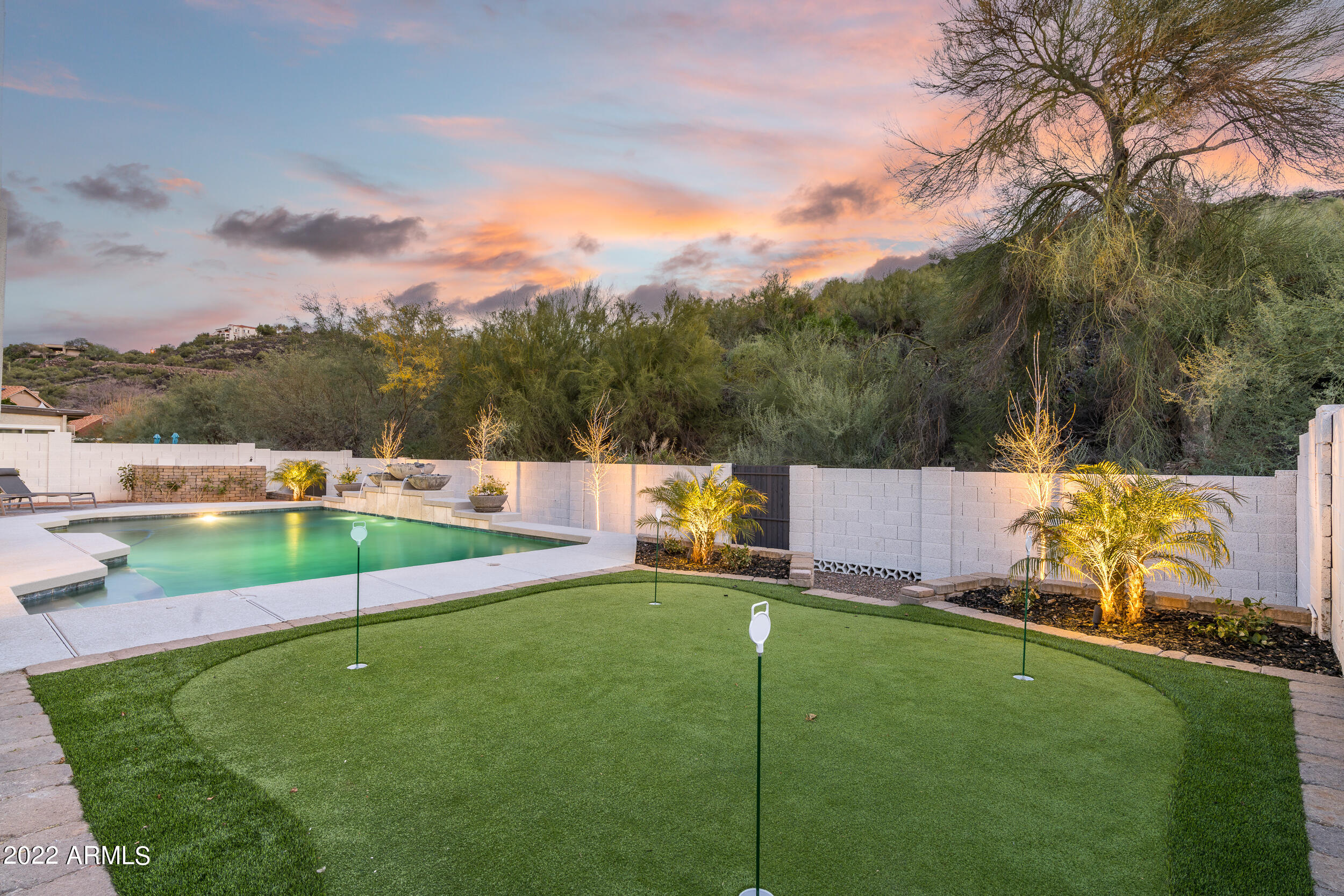 1641 West Evans Drive Phoenix, AZ 85023 - Photo 51 of 52 a view of a golf course with a house