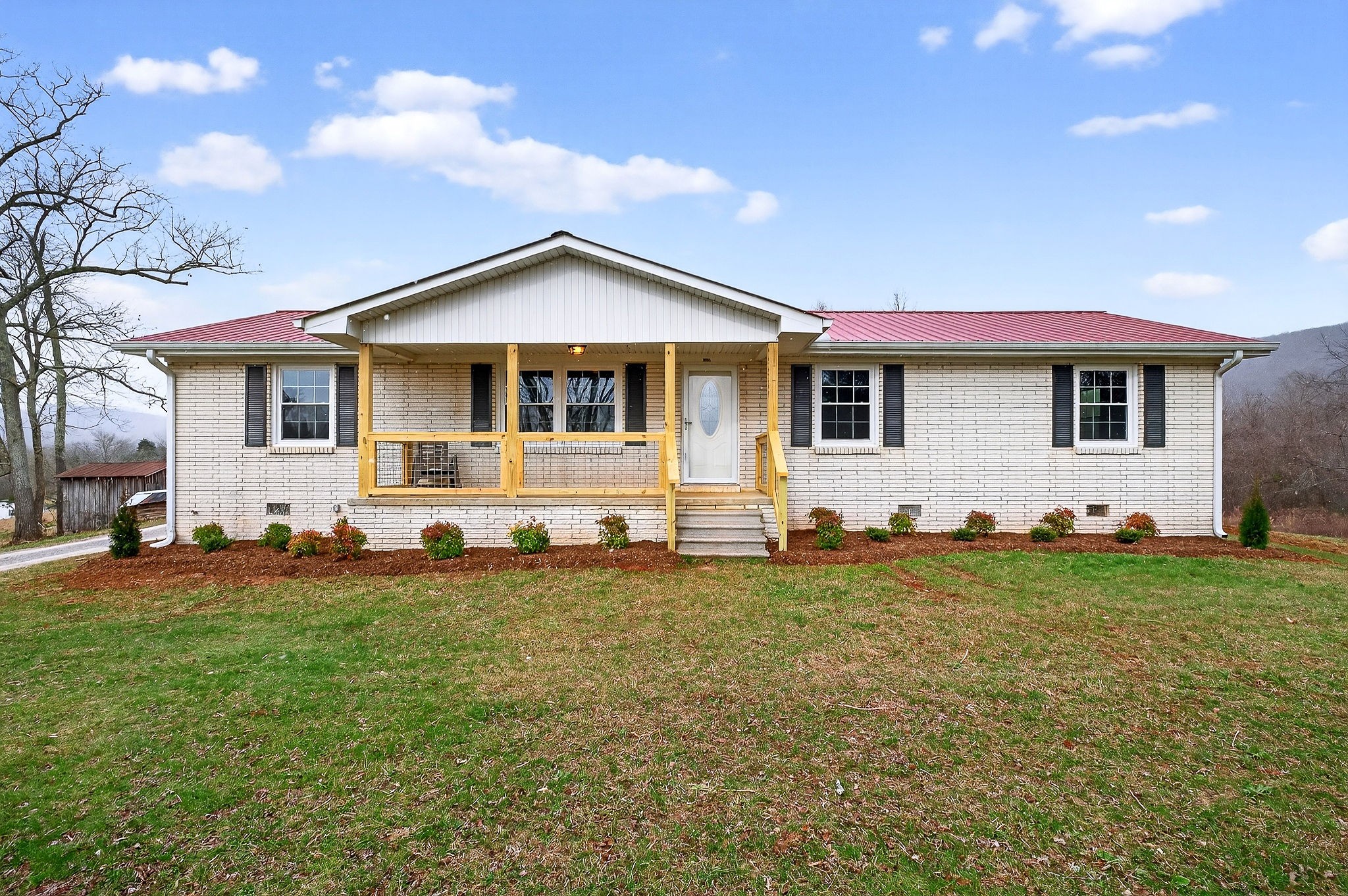 1528 Dry Creek Road McMinnville, TN 37110 - Photo 1 of 45 a front view of a house with a yard